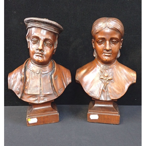 50 - A PAIR OF CARVED ELM BUSTS of an Austrian man and woman, signed 'Hughes, Maidstone 1874' 32cm high