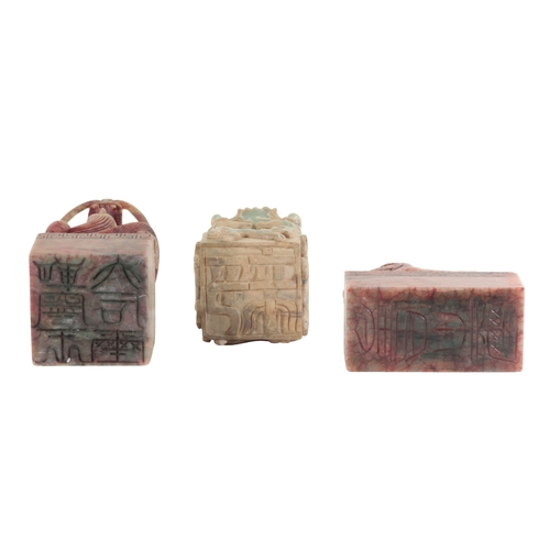 11 - A GROUP OF THREE CHINESE LARGE SOAPSTONE SEALS the tallest example, the turquoise coloured seal moun... 
