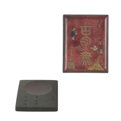 60 - A GROUP OF THREE JAPANESE INK STONES each cased in red painted boxes decorated with script and figur... 