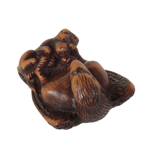 67 - A JAPANESE CARVED WOOD NETSUKE SIGNED HIDEHISA Edo Period, early 19th century, in the form of an eag... 