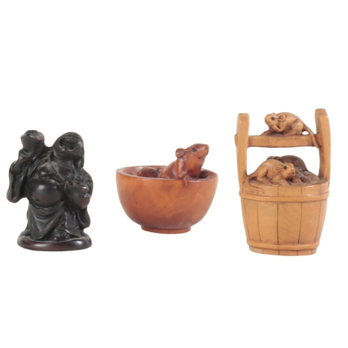 100 - TWO JAPANESE NETSUKE including an example modelled as rats in a bowl, signed, 4cm high; three rats i... 