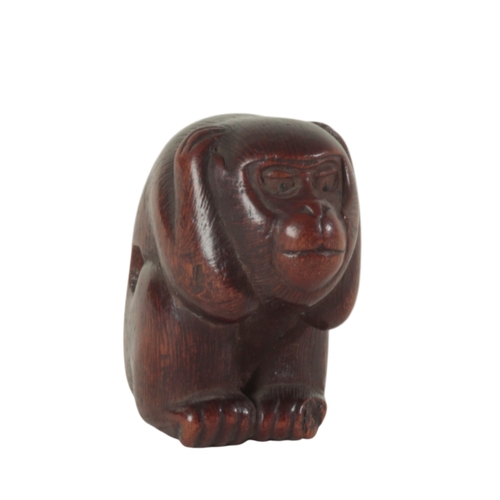 77 - A GROUP OF THREE JAPANESE CARVED WOOD NETSUKE, ONE SIGNED BY YOSHINOBU Edo period, two examples of m... 