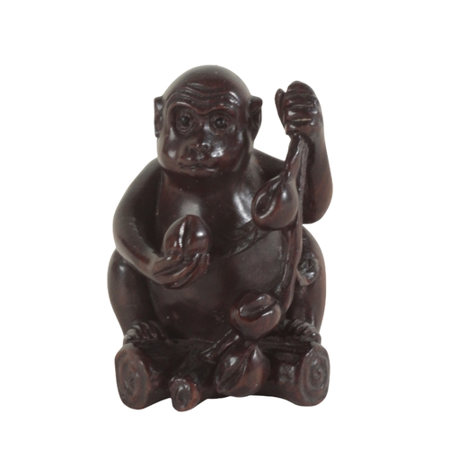 78 - TWO JAPANESE NETSUKE including a carved tagua nut example, in the form of a panda, 3.5cm high, and a... 