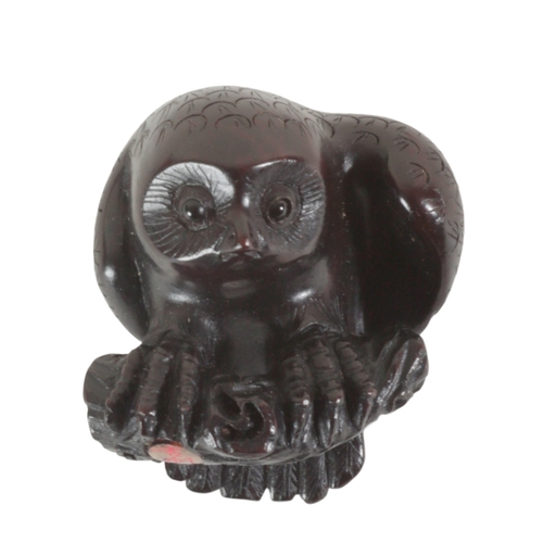 85 - A GROUP OF FOUR JAPANESE NETSUKE all signed, the tallest, a monkey on one leg, 7cm high, the toad 2.... 