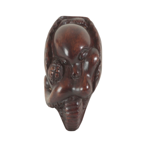 85 - A GROUP OF FOUR JAPANESE NETSUKE all signed, the tallest, a monkey on one leg, 7cm high, the toad 2.... 