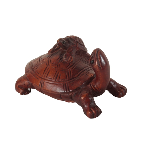 87 - A GROUP OF THREE CARVED WOOD NETSUKE including a Meiji period figured monkey, with inlaid eyes, 5cm ... 