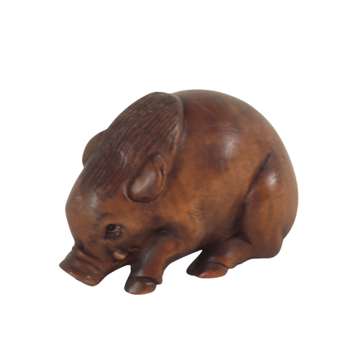 89 - A GROUP OF THREE JAPANESE CARVED WOOD NETSUKE including a late 19th century example, modelled as a w... 