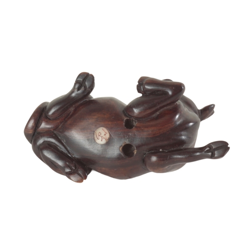 97 - THREE JAPANESE NETSUKE including an example modelled as a water buffalo, signed 6cm long, a skeleton... 