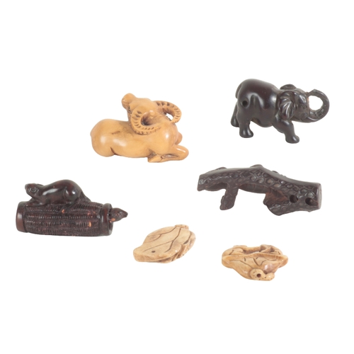 102 - A GROUP OF SIX JAPANESE NETSUKE including one modelled as rats with a basket, signed to one end, lig... 