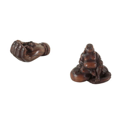 106 - A GROUP OF SIX JAPANESE NETSUKE including a carved wood group of two puppies playing, signed to the ... 