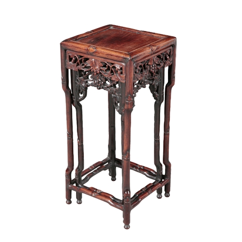 119 - THREE CHINESE TABLES including a hardwood two-tier side table, 20th century, with pierced and carved... 