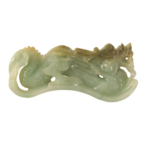 128 - A CHINESE RARE JADE PAPERWEIGHT Qing, 19th century, carved as a dragon with huanghuali wood stand, c... 