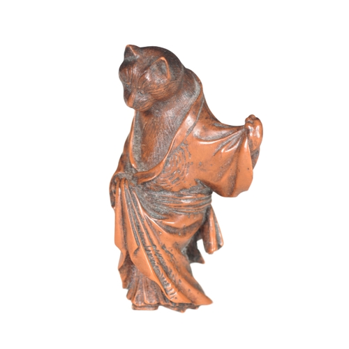 158 - A JAPANESE NETSUKE 20th century, resin, in the form of a cat dressed in a robe, 6cm high, together w... 