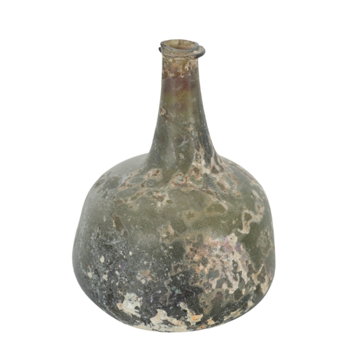 177 - A 17TH CENTURY ONION BOTTLE showing evidence of excavation, 15cm high, an antique glass vase, probab... 