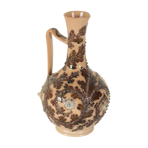 180 - GEORGE TINWORTH FOR DOULTON LAMBETH: A SEAWEED EWER the stoneware body incised and glazed in dark br... 