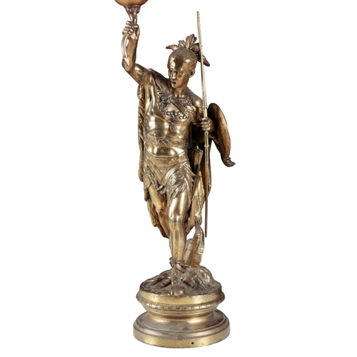 184 - A GILT METAL TABLE LAMP modelled as a fighting warrior, standing on a circular base, 74cm high