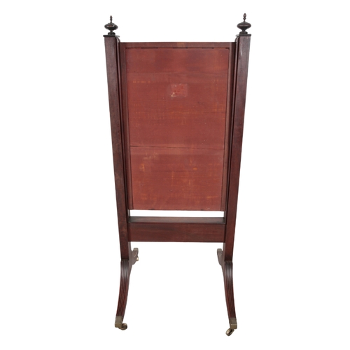 307 - A REGENCY MAHOGANY CHEVAL MIRROR early 19th century, the adjustable mirror plate in a cushion frame,... 