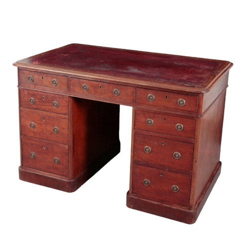 308 - A REGENCY MAHOGANY PEDESTAL DESK 19th century, with a red leather inset writing surface, over an arr... 