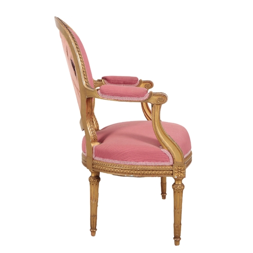 309 - A LOUIS XVI STYLE GILTWOOD THREE PIECE SUITE 20th century, with cotton covers, the oval backs with c... 