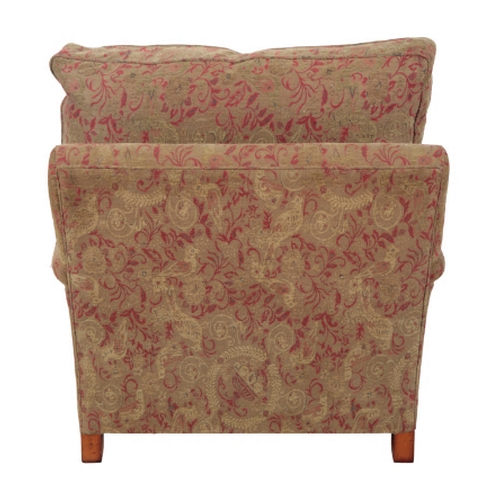 325 - A HOWARD STYLE âCOUNTRY HOUSEâ ARMCHAIR upholstered in red and green floral, urn and bird fabric... 