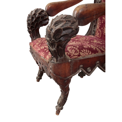 334 - AN IMPRESSIVE EARLY 19TH CENTURY MAHOGANY ARMCHAIR carved throughout in relief with flowers and leav... 