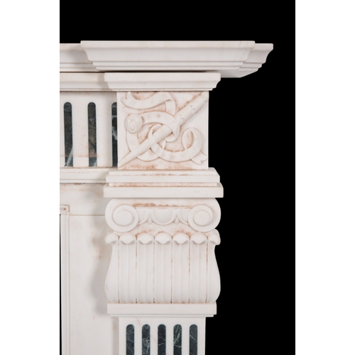 362 - A GEORGE III STYLE WHITE MARBLE CHIMNEY PIECE the inverted breakfront mantel over a frieze centred b... 