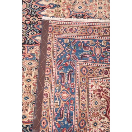 380 - A MOUD CARPET North East Persia, 20th Century, woven in blue and red with geometric Herati filled ov... 