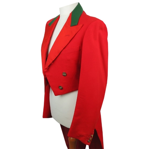 381 - FREDERICK BELL & SON OF LIVERPOOL: A RED TAILCOAT with brass hunt buttons and green collar, size 34