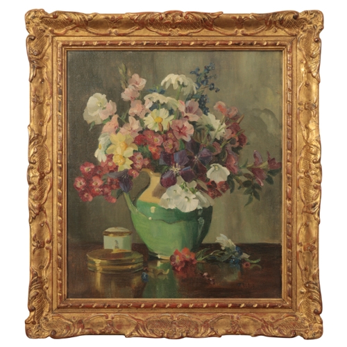 310 - FREDA BLOIS (1880-1943) A still life study of mixed flowers signed lower right, oil on canvas, 57cm ... 