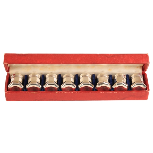 665 - CARTIER: A SET OF EIGHT STERLING SILVER MINIATURE SALT AND PEPPER SHAKERS housed in an original cust... 