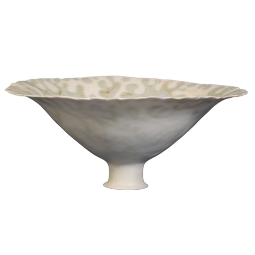 678 - *MARY ROGERS (1929-2021): A FINE FOOTED PORCELAIN DISH the bowl interior with mottle swirl decoratio... 