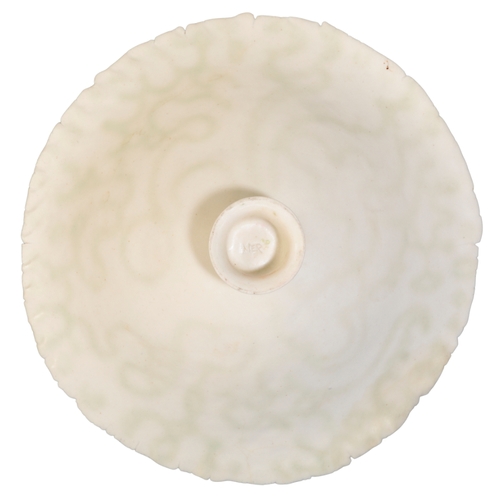 678 - *MARY ROGERS (1929-2021): A FINE FOOTED PORCELAIN DISH the bowl interior with mottle swirl decoratio... 