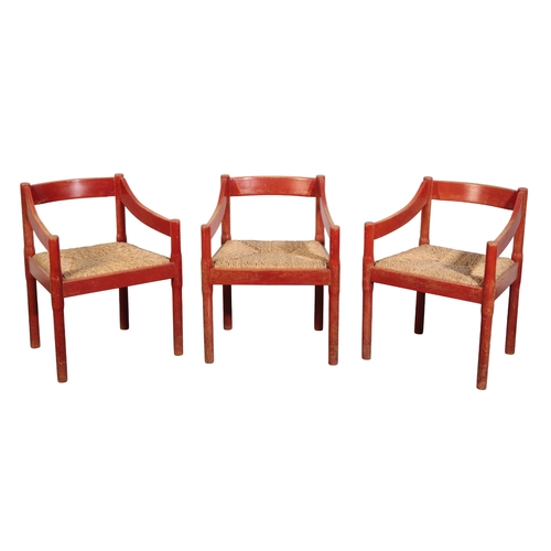 692 - VICO MAGISTRETTI (1920-2006): A SET OF SIX 'CARIMATE' CHAIRS the aniline-red stained  beech frames w... 