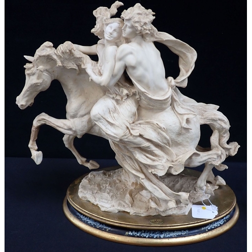 26 - A LARGE GUISEPPE ARMANI, FLORENCE GROUP lovers on horseback 42cm high (some damage)