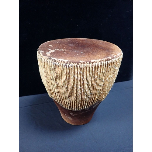 31 - A TRIBAL ANIMAL SKIN DRUM 40cm diam.