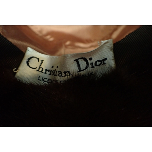 106 - CHRISTIAN DIOR: A VINTAGE SKIN AND FUR HAT in a 'Harrods' hat box