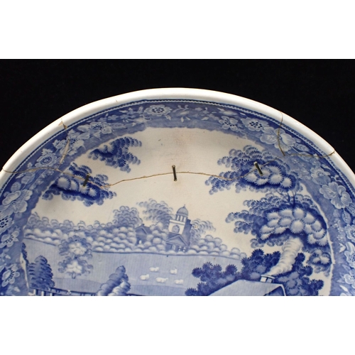 115 - A COLLECTION OF 19TH CENTURY AND LATER DECORATIVE PLATES including Willow pattern, and a cake or che... 