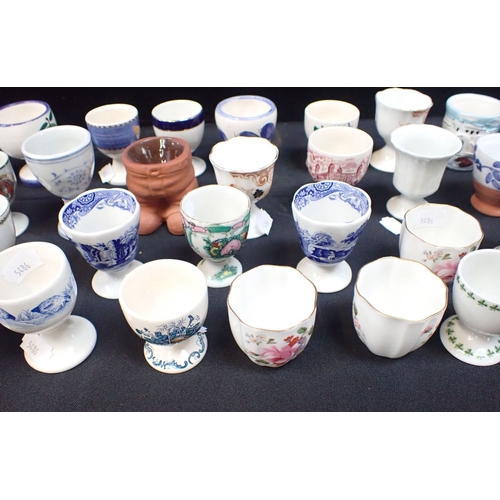 119 - A COLLECTION OF EGG CUPS Royal Crown Derby, Haviland, Spode and others