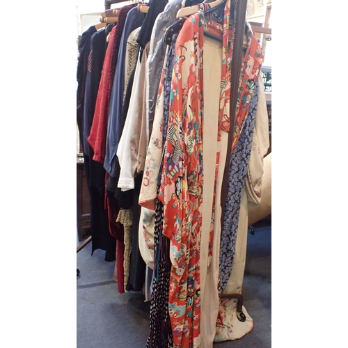 192 - ALL SAINTS: A SILK EVENING DRESS together with a collection of vintage clothing, incuding a red kimo... 