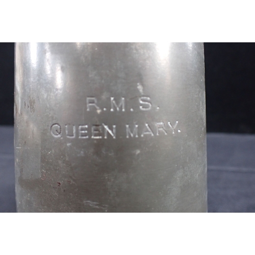 246 - R M S QUEEN MARY, A PEWTER BAR TANKARD with glass base, etched with The Last Days and a hanging man