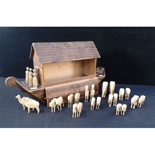 249 - A 19TH CENTURY FOLK ART HAND BUILT NOAH'S ARK constructed from pine with numerous carved pine animal... 