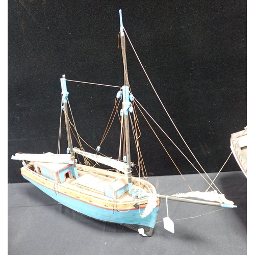 279 - A COLLECTION OF FOLK ART FISHING BOATS