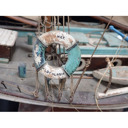 279 - A COLLECTION OF FOLK ART FISHING BOATS