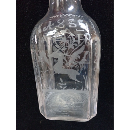 283 - AN EARLY 19th CENTURY WATER FLASK with engraved decoration, initials and 1833 date, with a glass of ... 