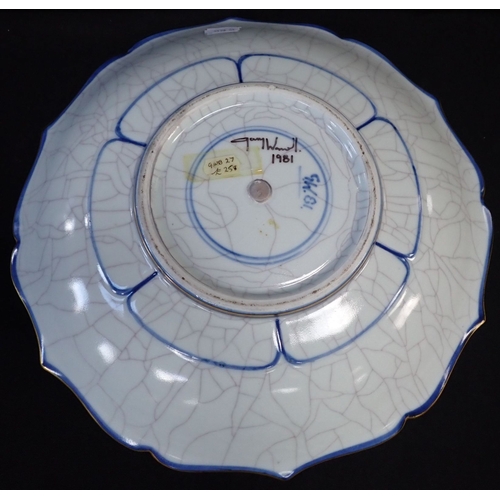 323 - GARY WORNELL: (B. 1952) A CRACKLE-GLAZED DISH of lobed form and Asian influence, with blue and gilt ... 