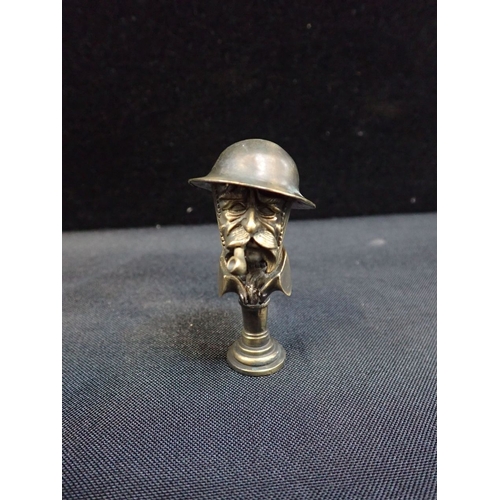 415 - A WW1 YPRES OLD BILL SOUVENIR PIPE TAMPER with a table clock in the form of a WW1 tank