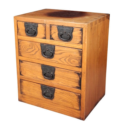 614 - A PAIR OF CHINESE ELM CABINETS OR BEDSIDE CHESTS each 45cm wide (faded, the tops with dark patches)