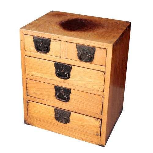 614 - A PAIR OF CHINESE ELM CABINETS OR BEDSIDE CHESTS each 45cm wide (faded, the tops with dark patches)