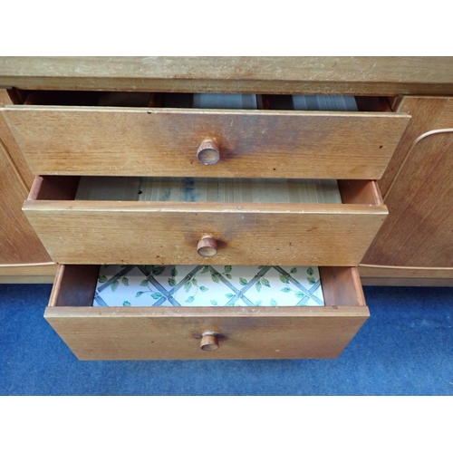 654 - A MID-CENTURY MODERN TEAK DINING SUITE, THE TABLE STAMPED 'NATHAN FURNITURE' comprising sideboard 21... 