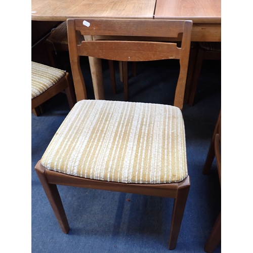 654 - A MID-CENTURY MODERN TEAK DINING SUITE, THE TABLE STAMPED 'NATHAN FURNITURE' comprising sideboard 21... 